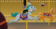 Tom land on the merry go round with Jerry falling off the horse