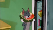 Tom eats Watermelon