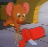 Jerry slicing the dynamite stick like pepperoni