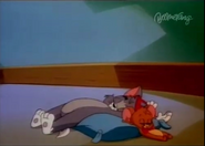 Tom and Jerry sleeping together