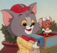 Tom with Jerry in a fake music box