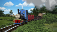 Красный узкоколейный вагон в мультфильме «Король железной дороги»