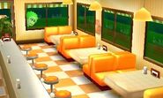 A Mii peeks through the window of an empty cafe.