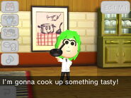 A Mii being given a Frying Pan in Tomodachi Life.