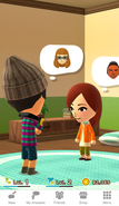 A pair of Miis talking with one another.