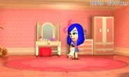 A female Mii holding a cat.