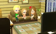 A family of Miis watching the TV