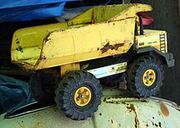 Old-style steel toy dump truck by Tonka.