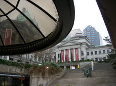 A shot taken from the rink, showing the Art Gallery and the Bird sculpture.