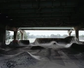 There's nothing in the background but trees in reality.