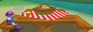 A toon sitting at the picnic table