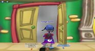 A Toon walking into Toontown Sign Factory. Note the fog.