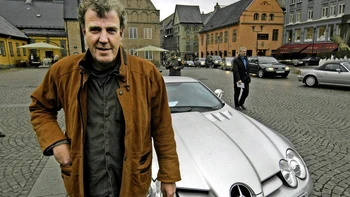 Jeremy Clarkson poses in front of the McLaren SLR.