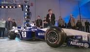 Clarkson showing off a Formula 1 Car
