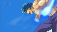 Toriko doing Twin Kugi Punch with Fork Shields on his fists