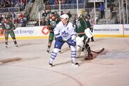 Devereaux watching the play in front of the net