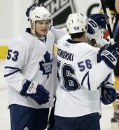 Mitchell celebrates a Maple Leaf goal with teammates