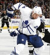 Frogren guards the puck