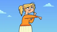 Emma punches the air.