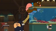 The waiter stops Chef from stealing a lobster.