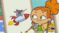 Izzy paints a rat riding a rocket.