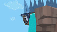 The shark hangs off a waterfall in Top Dog.