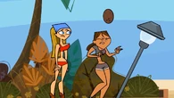 Courtney gets hit on the head with a coconut.