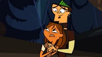 Courtney jumps into Duncan's arms after being frightened by a wolf, much to Duncan's delight.