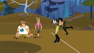 Gwen crossing the finish line.png (1.31 MB) Gwen crosses the finish line and wins Total Drama Island.