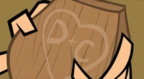 Duncan's carving on the back of a wooden Courtney head.