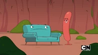 A hot dog welcomes Courtney's couch.