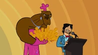 Chef holding all of the awards in the first Total Drama Action elimination ceremony.