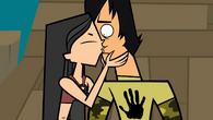 Trent is surprised when Heather suddenly kisses him.