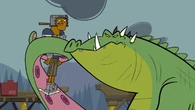 After spitting out Cameron, the mutated croc grabs Lightning…