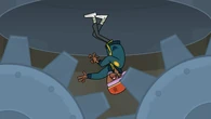 Damien is pushed into the "Death Boot" slide by Millie.
