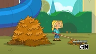 Bridgette finishes Noah's leaf jumping pile.