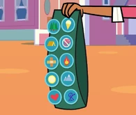 Courtney shows all of her badges to the kids.