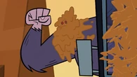 Sasquatchanakwa is pelted with chocolate.