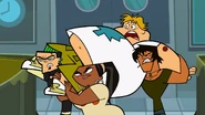 Duncan, Leshawna and Justin immediately lift up Owen.