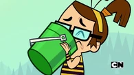 Beth sniffs the bucket.