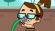 Beth uses a hose to clean out her nose strills.