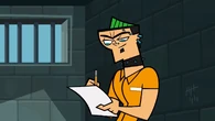 Duncan writing a letter to his mother while in prison.