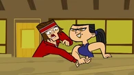 TDI Opening 19.png (888 KB) Eva wins an arm-wrestling match against Tyler