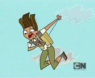 Courtney begins to pull the parachute cords.