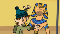 Chris shoves Ezekiel down in "Walk Like an Egyptian—Part 1."