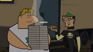 Duncan looks at and smells the pizza, stating it to be okay.