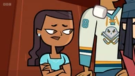 Priya allows the marshmallows to hit her without any resistance.