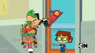 Duncan replaces Courtney's hat with a fruit hat.