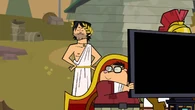 The chubby intern blows a raspberry at Chris while he isn't watching.