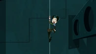 Gwen sliding down the fireman's pole.